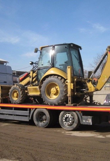 Успешная организация доставки погрузчика CAT из Китая.