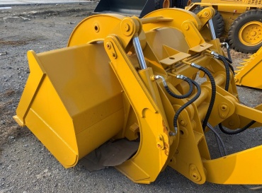 Расширение возможностей фронтальных погрузчиков: навесное оборудование для повышения эффективности и универсальности